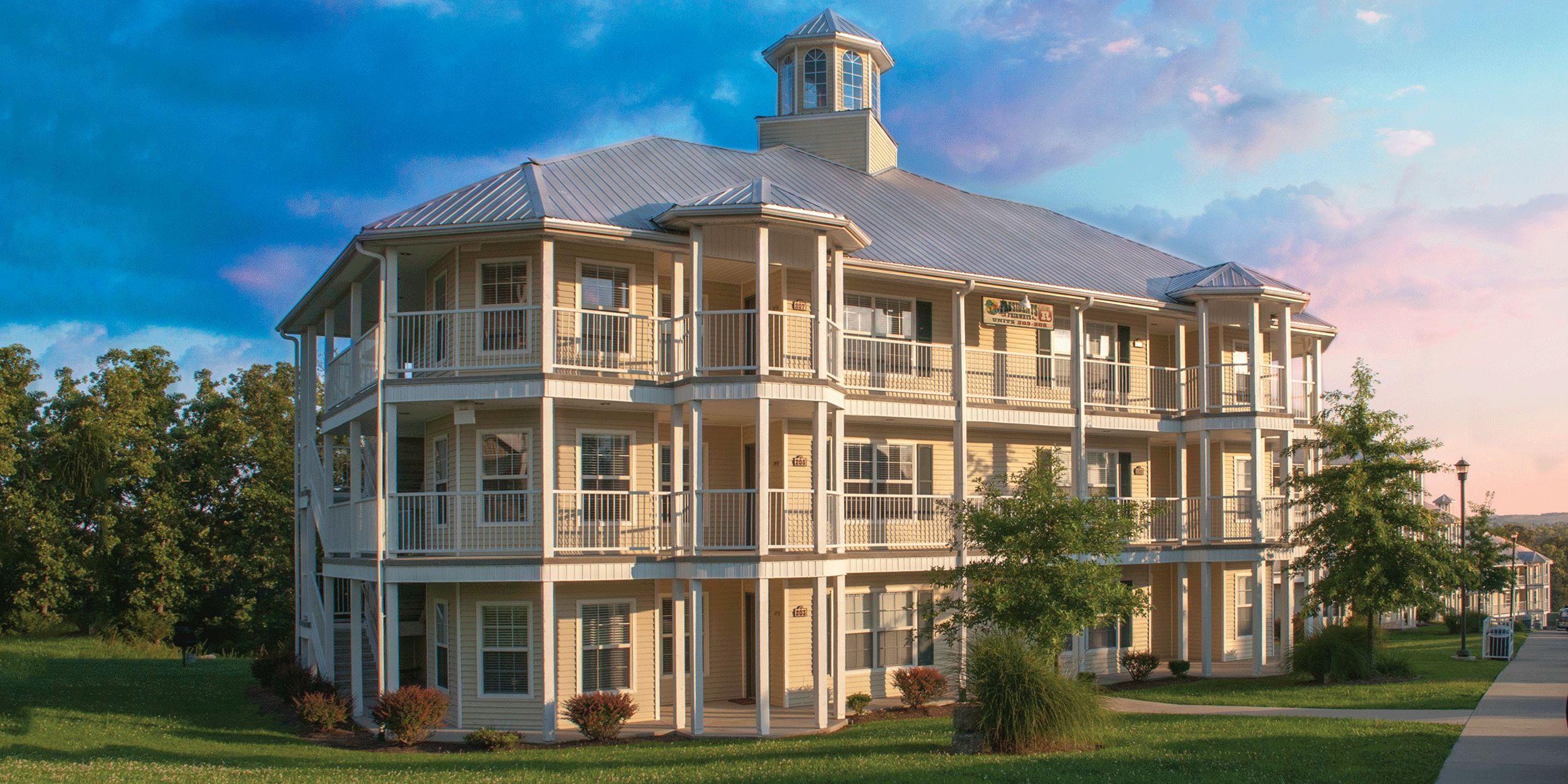 Resort lodging building surrounded by greenery